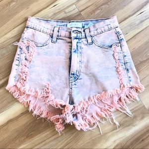 Mid-high waisted cut off jean shorts